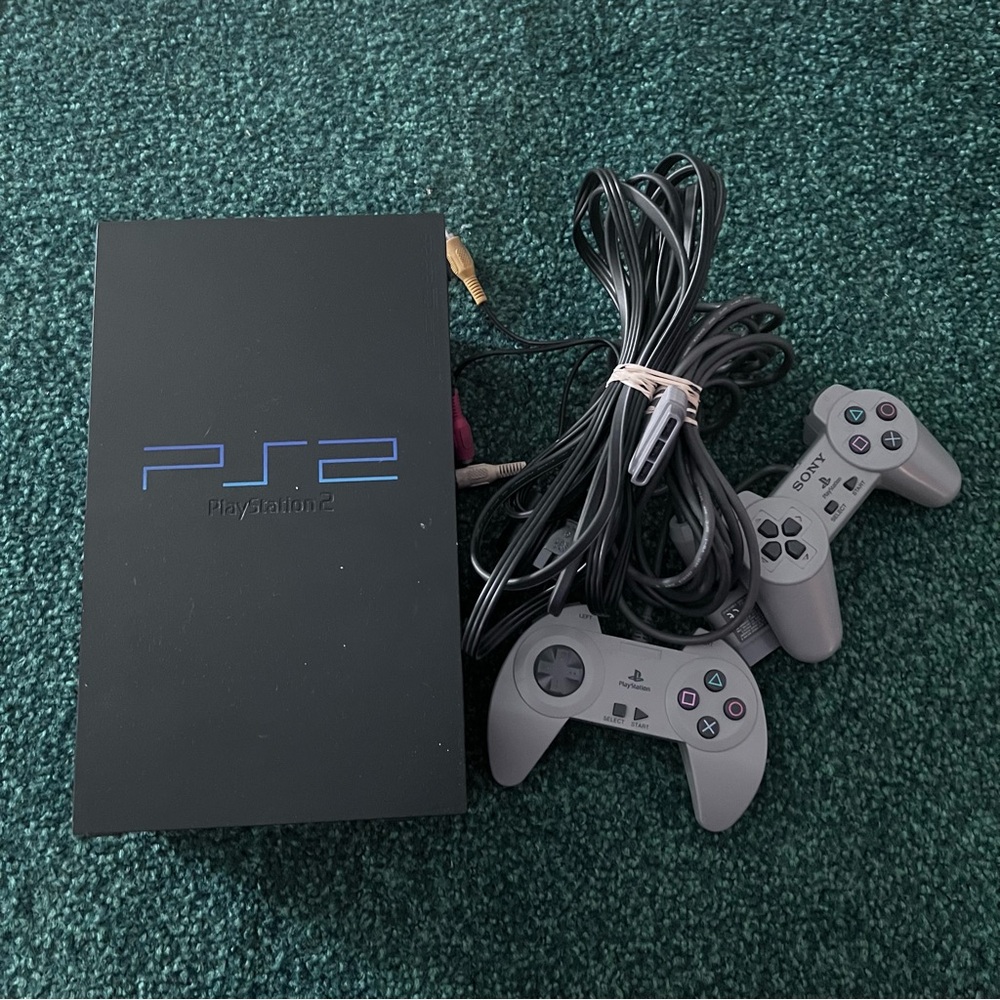 Sony PlayStation 2 Console with Dual Black and Gray Controllers